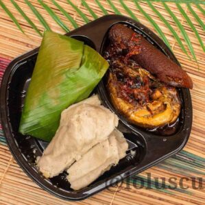 Ekuru and Eko with smoked fish and ponmo sauce