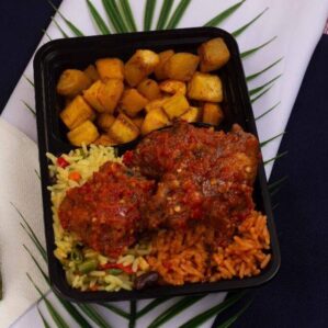 Naija Party Combo (Fried & Jollof rice) with Chicken, Hake Fish and Side of Vegetable Salad