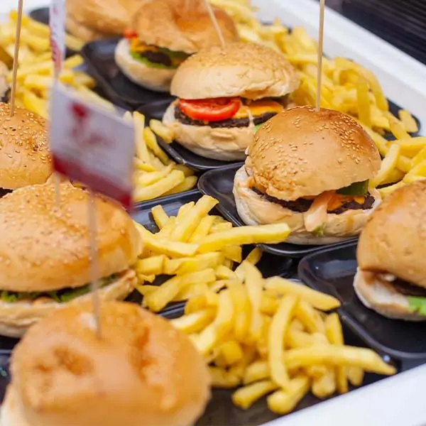 burgers and fries on a tray