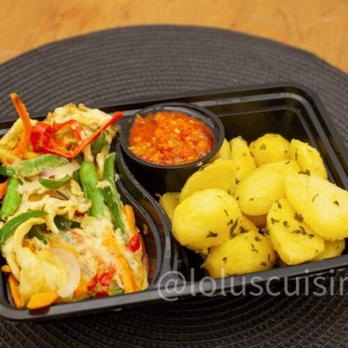 Buttered Irish Potatoes And Omelette