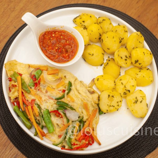 Buttered irish potato with omlette Buttered irish potato with omlette
