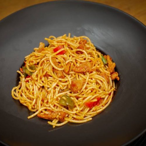 Meaty jollof spaghetti_